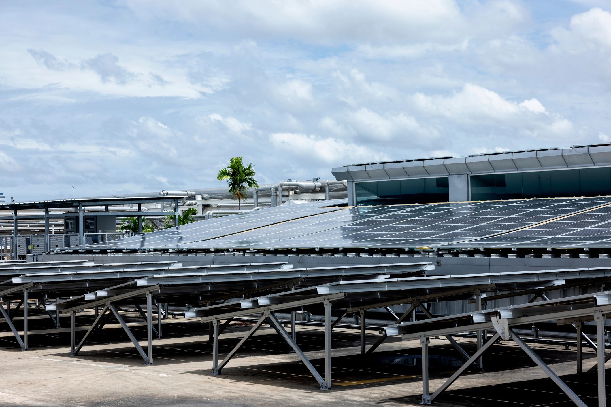 Commercial building with rooftop solar representing integrated energy optimization